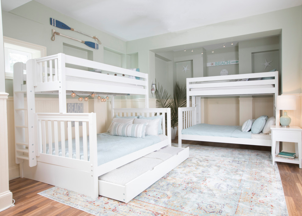 This is an example of a beach style kids' room in Other.