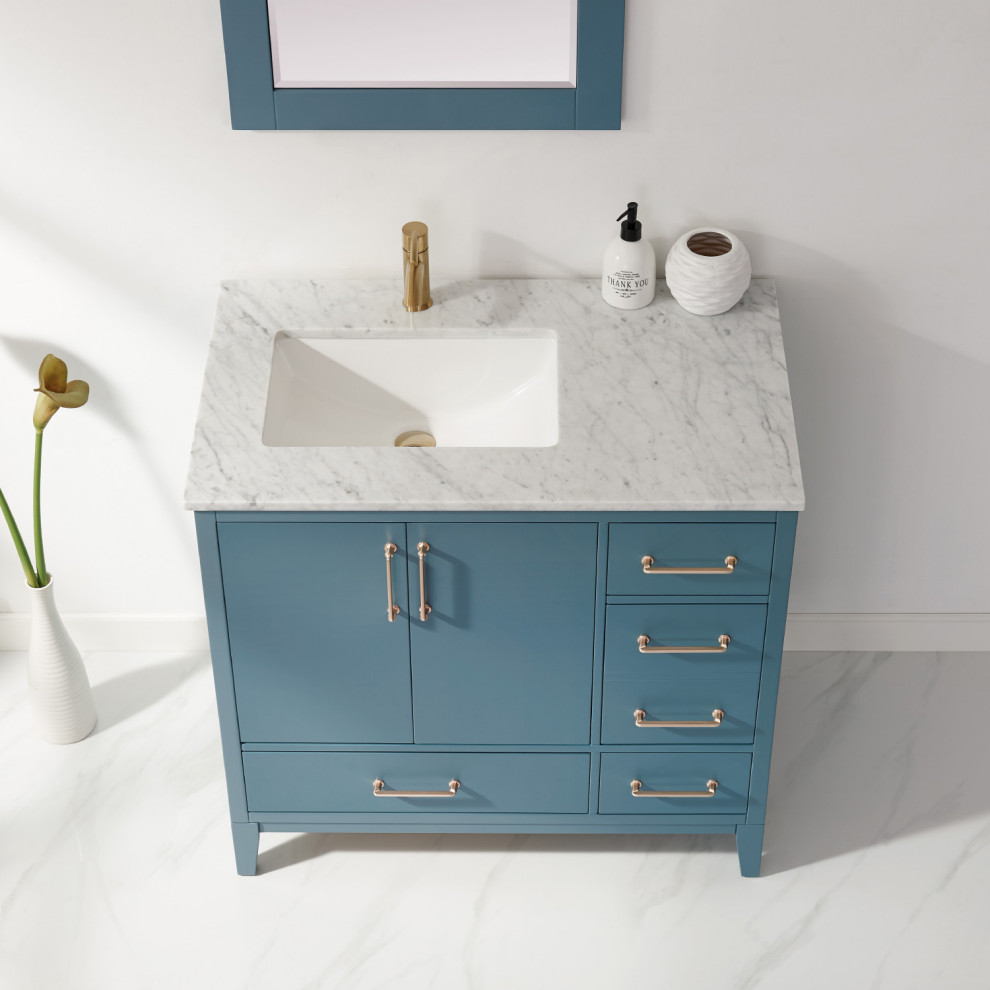 Idée de décoration pour une petite salle de bain design avec meuble simple vasque et meuble-lavabo sur pied.