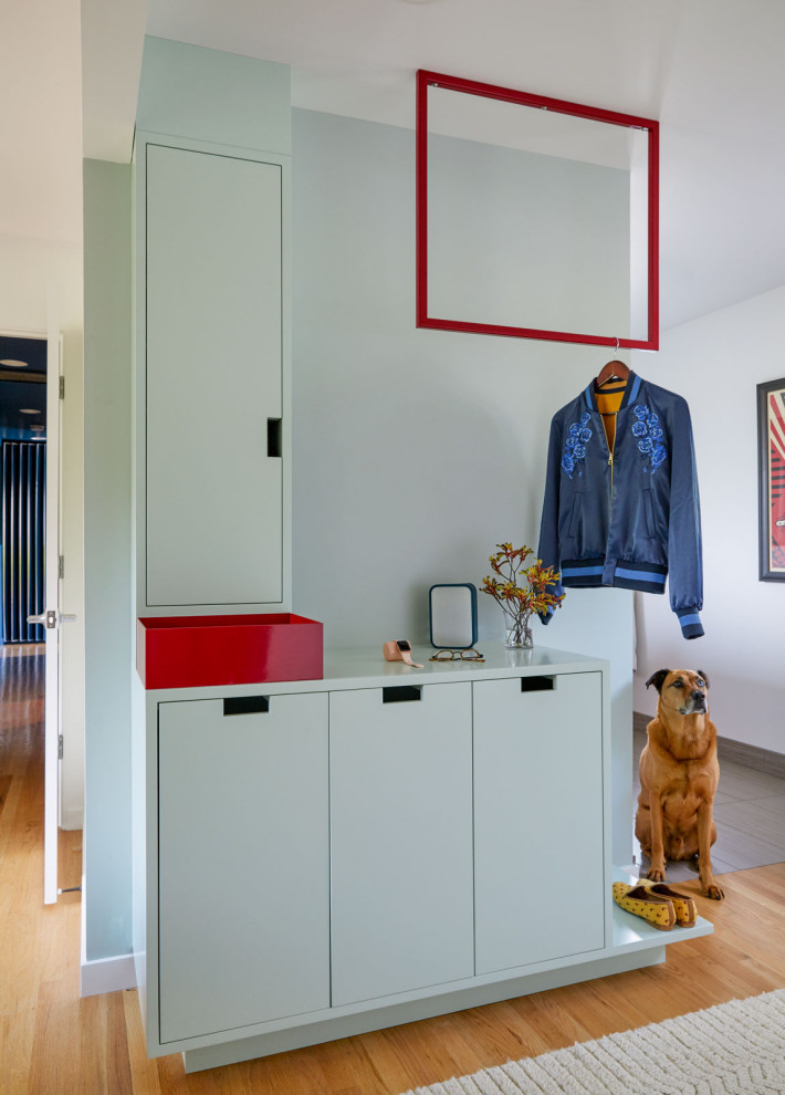 Photo of a contemporary storage and wardrobe in Portland.