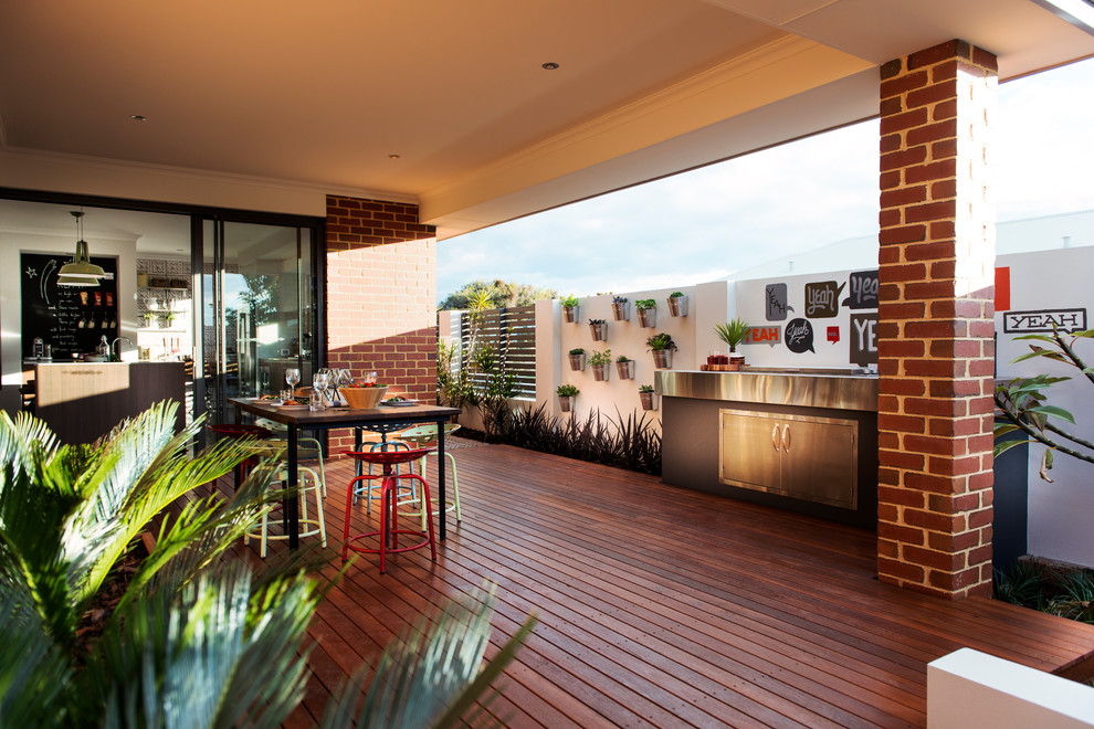 Small industrial backyard deck in Perth with a fire feature and no cover.