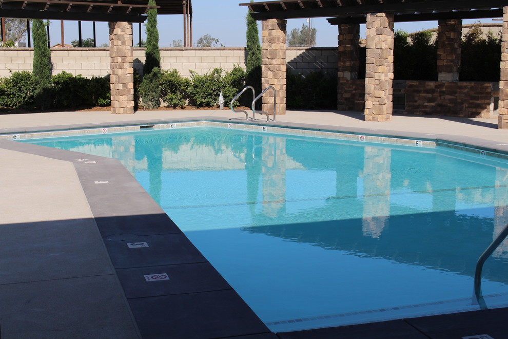 Inspiration for a rectangular pool remodel with decking