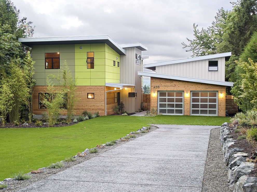 Photo of a contemporary apartment exterior in Seattle with wood siding and a shed roof.