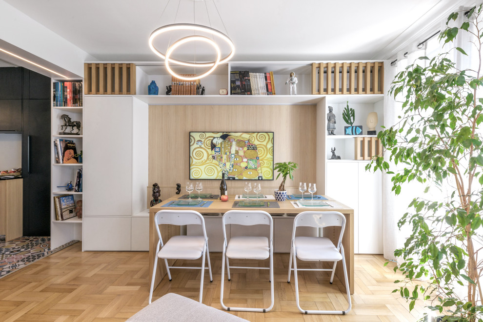 This is an example of a small contemporary open plan dining room in Lyon.