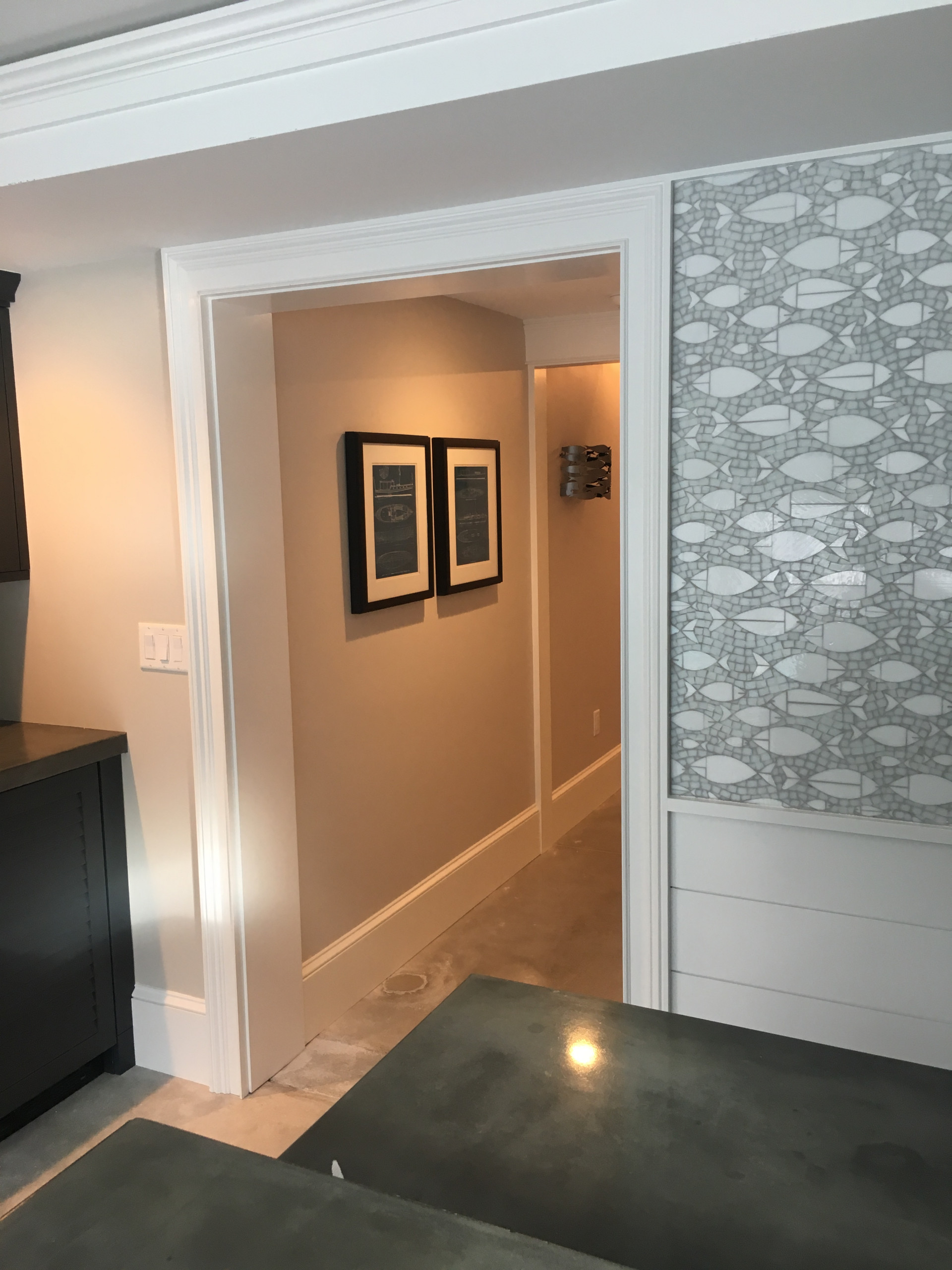 A fully equipped laundry room with a built ins