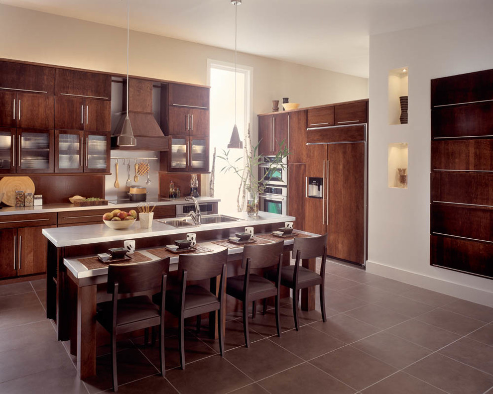 Mid-sized transitional l-shaped terra-cotta tile and beige floor eat-in kitchen photo in Miami with a double-bowl sink, flat-panel cabinets, dark wood cabinets, quartz countertops, stainless steel appliances, an island and brown backsplash