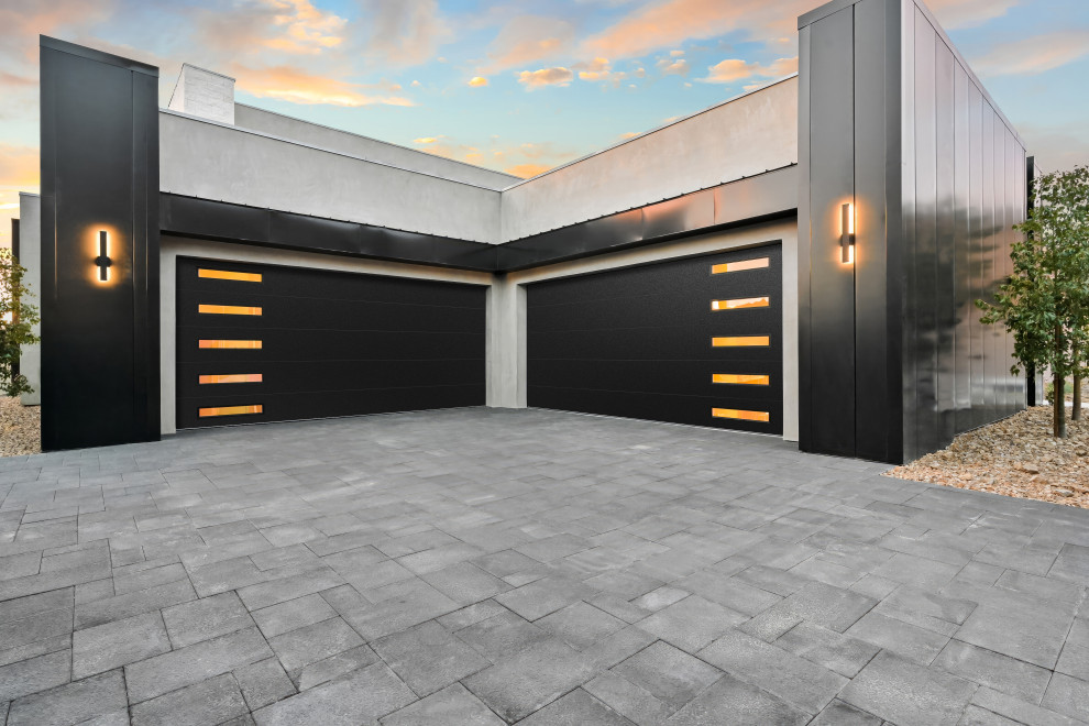 Large modern attached garage in Las Vegas with four or more cars.