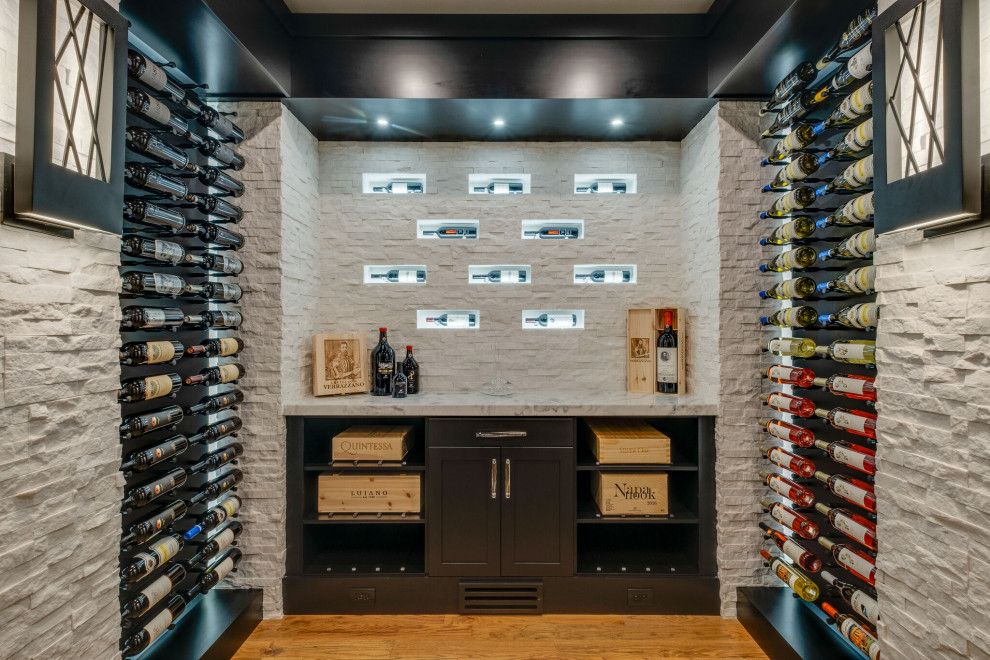 Mid-sized transitional wine cellar in Nashville.