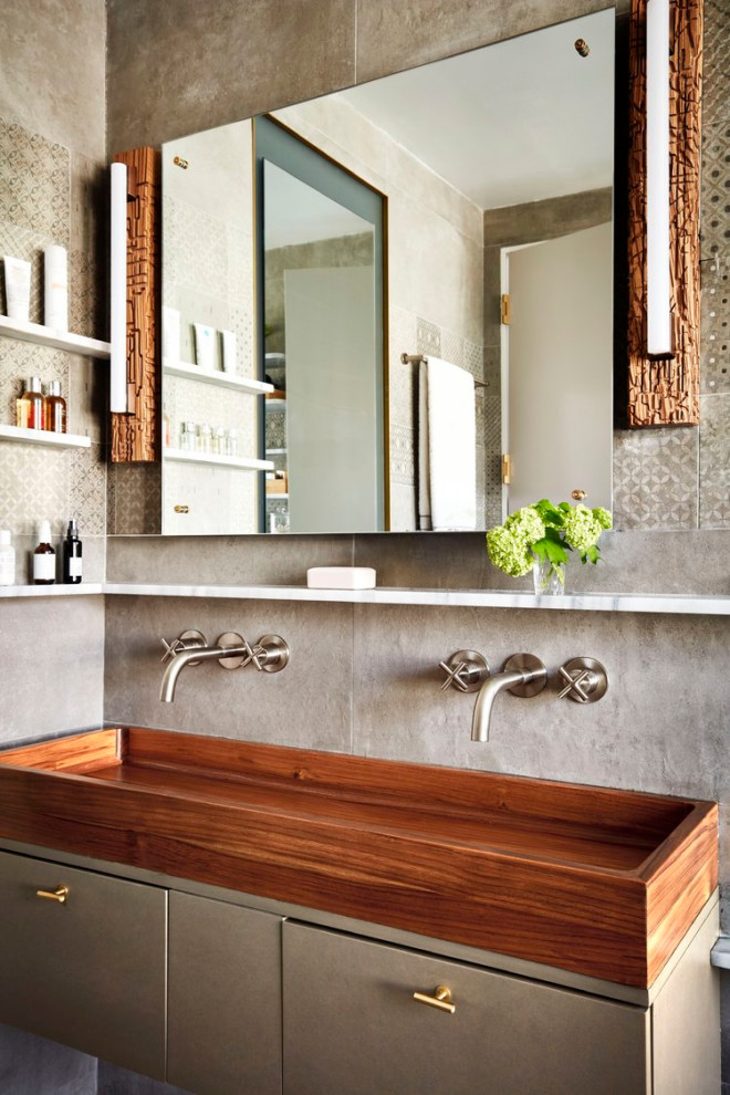 Inspiration for an industrial bathroom in New York with a double vanity and a floating vanity.