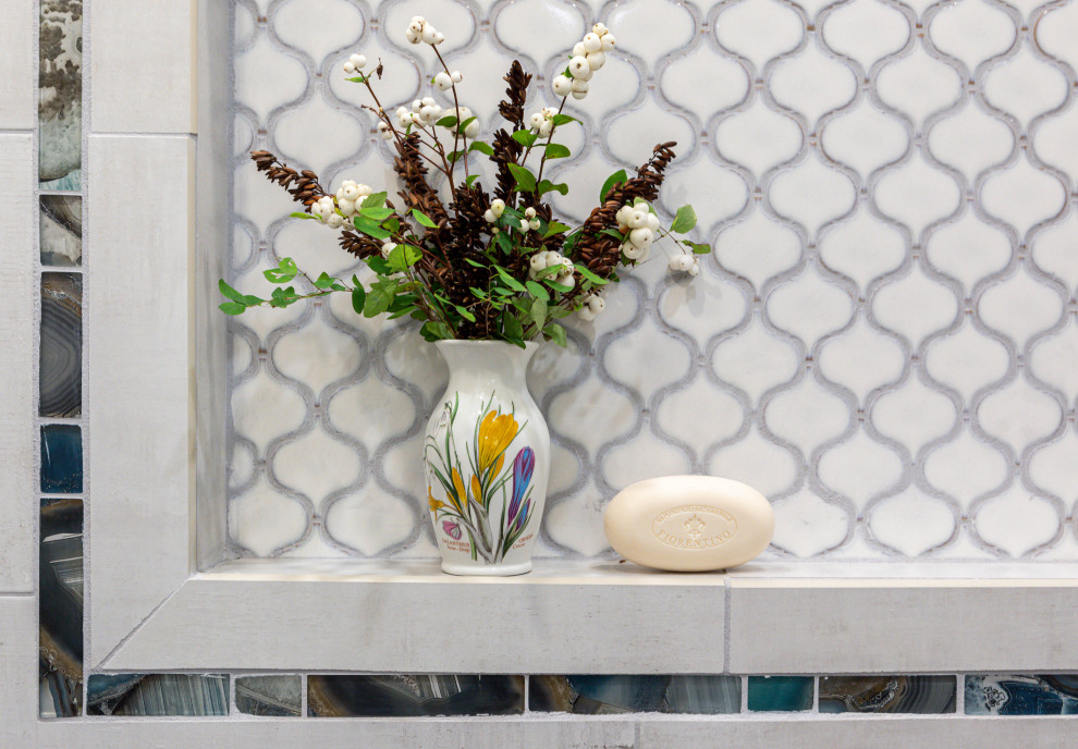 Inspiration for a large rustic master gray tile and ceramic tile porcelain tile, gray floor and double-sink claw-foot bathtub remodel in Seattle with dark wood cabinets, a one-piece toilet, white walls, a drop-in sink, quartz countertops, a hinged shower door, gray countertops, a built-in vanity and a niche