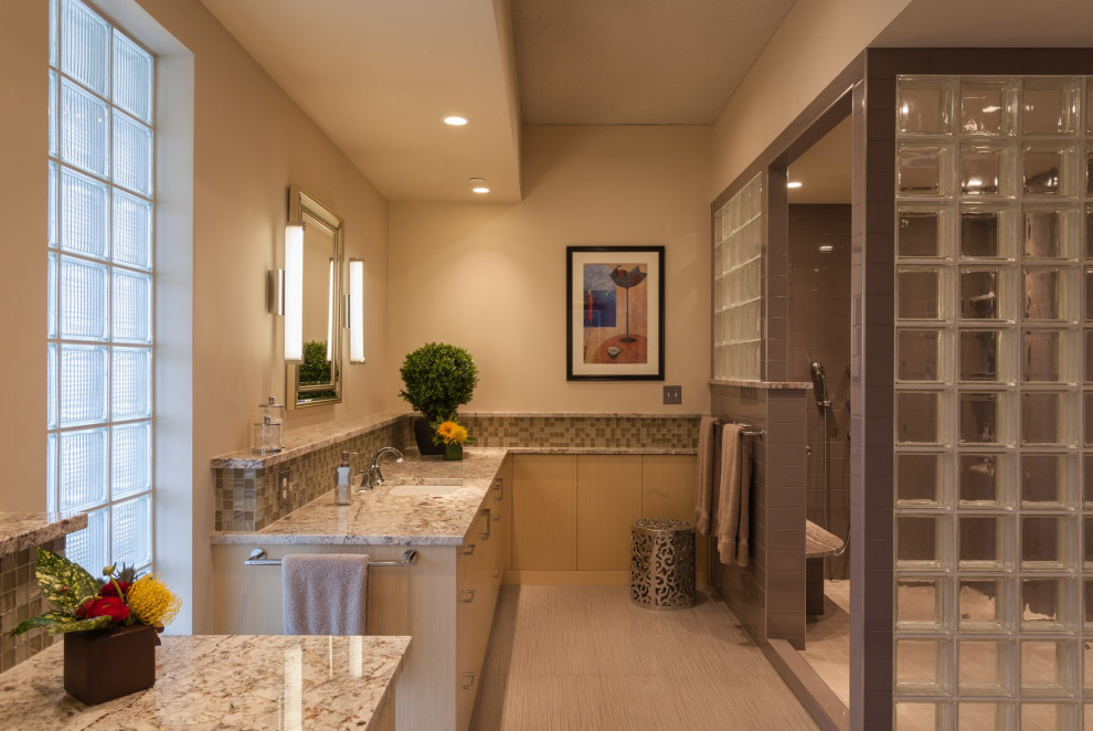 Example of a mid-sized trendy master bathroom design in Minneapolis with a built-in vanity