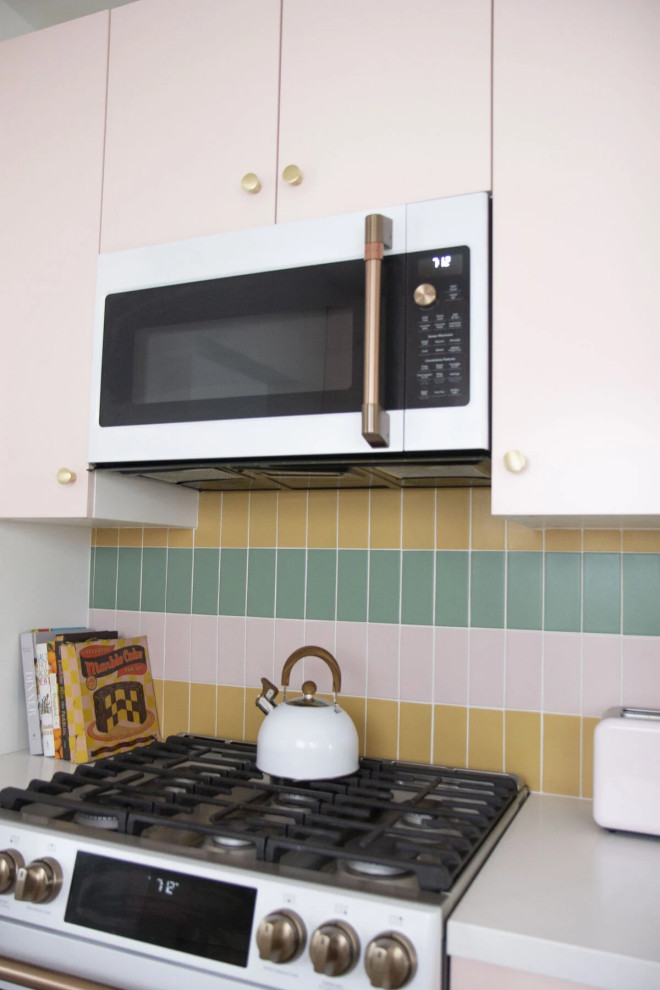 Eclectic kitchen photo in Los Angeles with ceramic backsplash