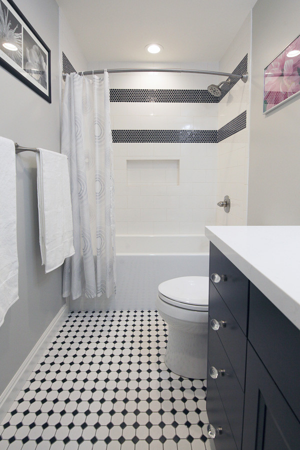 Mid-sized transitional kids' gray tile and porcelain tile porcelain tile, gray floor and double-sink bathroom photo in Salt Lake City with recessed-panel cabinets, brown cabinets, gray walls, an undermount sink, quartz countertops, white countertops and a built-in vanity