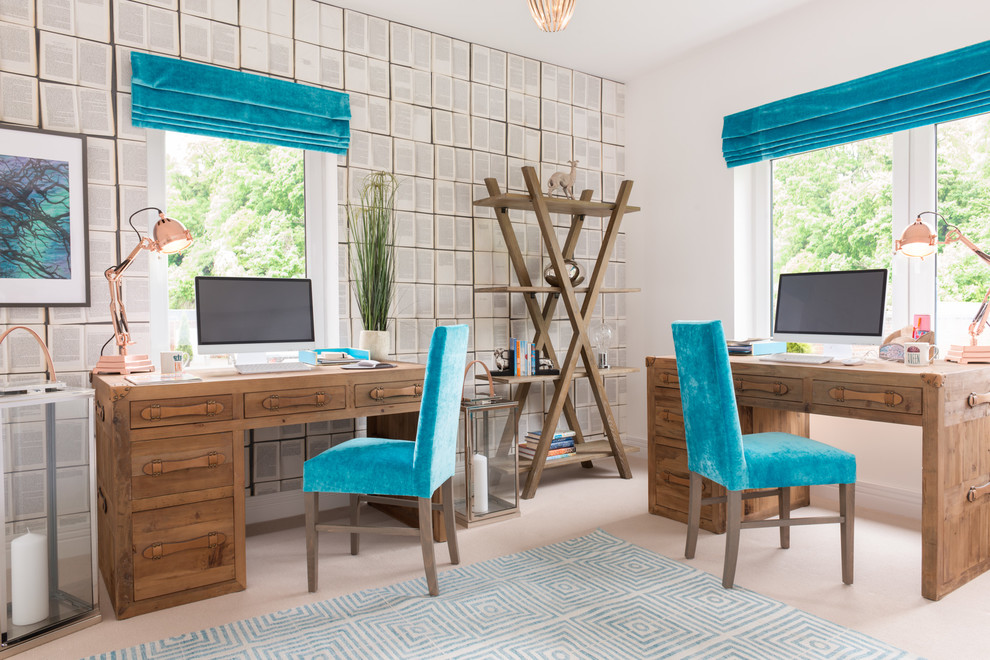 Beach style study room in London with white walls, carpet and a freestanding desk.