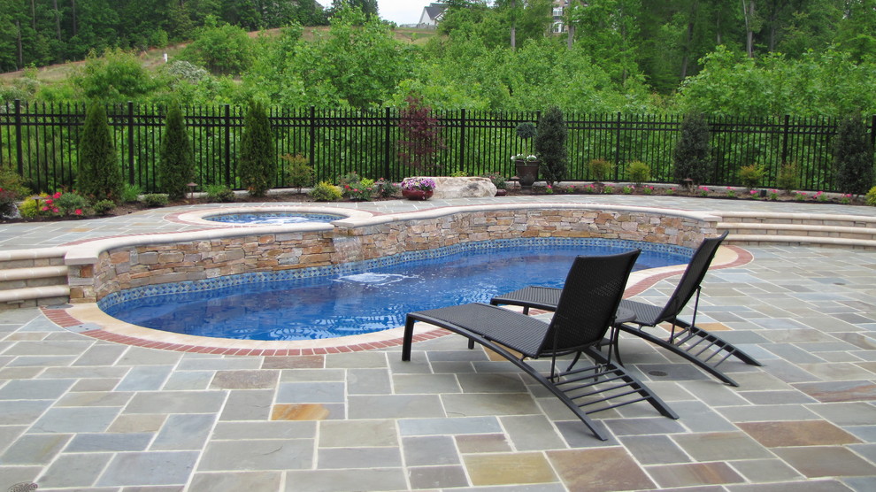 This is an example of a small traditional custom-shaped pool in Richmond.