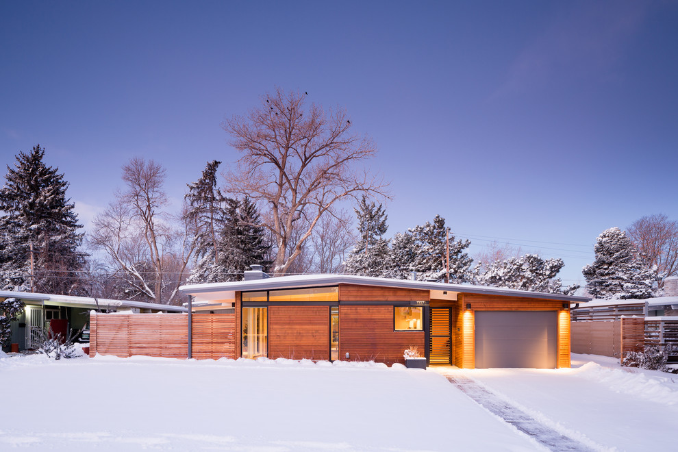 Photo of a midcentury home design in Denver.