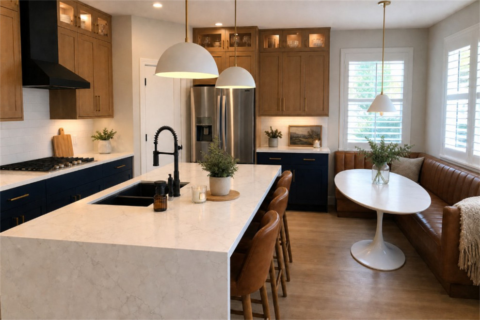 AFTER: WATERFALL ISLAND WITH BLACK SINK & BANQUETTE NOOK
