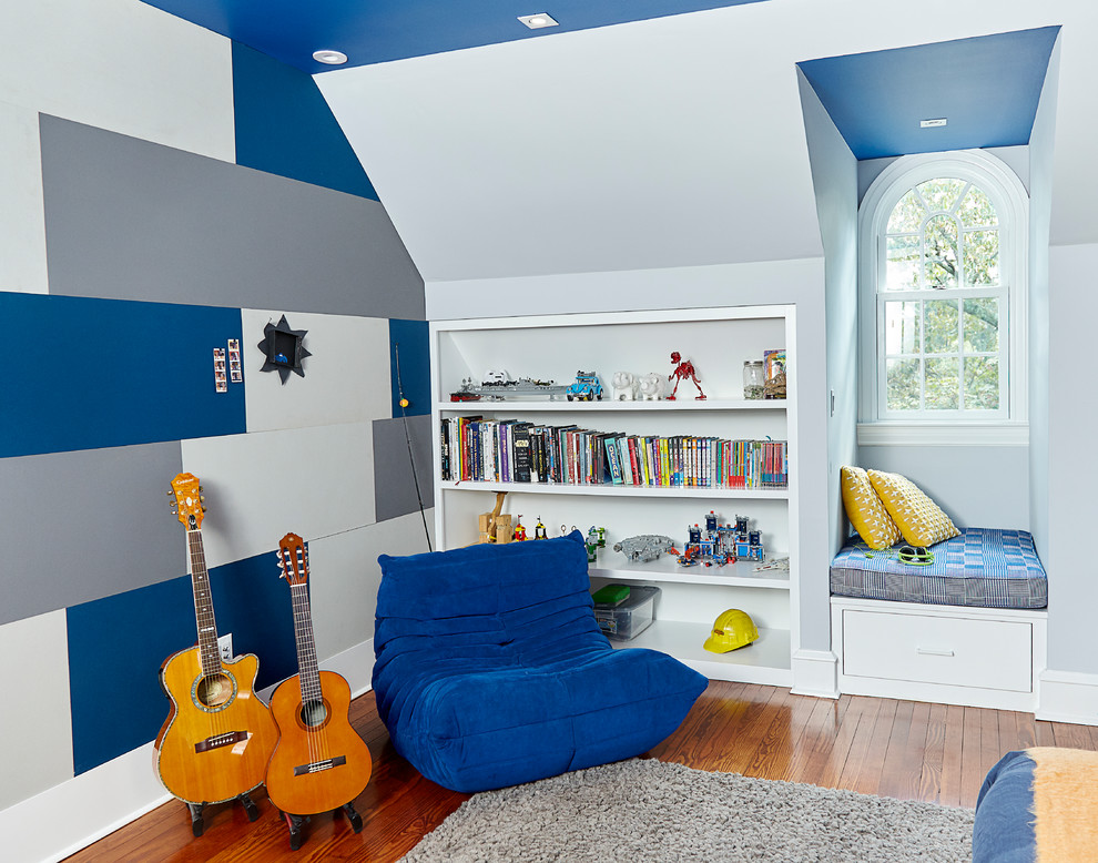 Design ideas for a large modern kids' room for boys in Wilmington with grey walls, medium hardwood floors and brown floor.