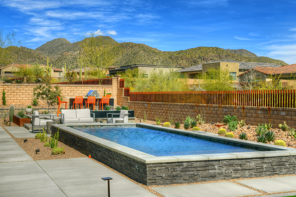 Inspiration for a mid-sized modern pool remodel in Phoenix