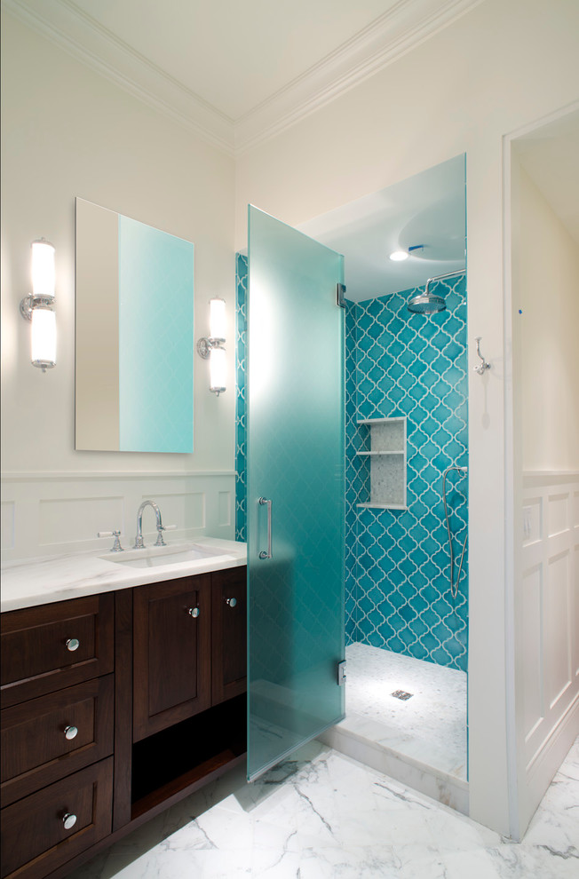 Design ideas for a mid-sized transitional master bathroom in Chicago with shaker cabinets, dark wood cabinets, a double shower, a two-piece toilet, blue tile, subway tile, white walls, marble floors, a drop-in sink, marble benchtops and a claw-foot tub.