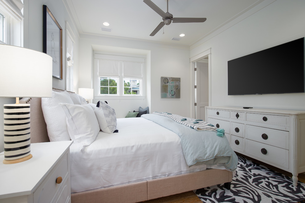 This is an example of a beach style bedroom.