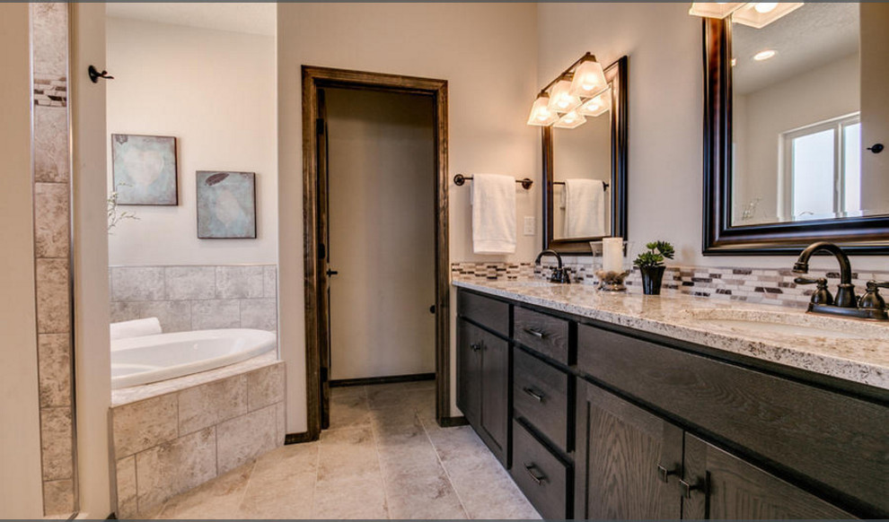 Inspiration for a mid-sized transitional master bathroom in Albuquerque with shaker cabinets, dark wood cabinets, a corner tub, beige tile, brown tile, gray tile, mosaic tile, beige walls, ceramic floors, an undermount sink, granite benchtops, beige floor, an alcove shower and an open shower.