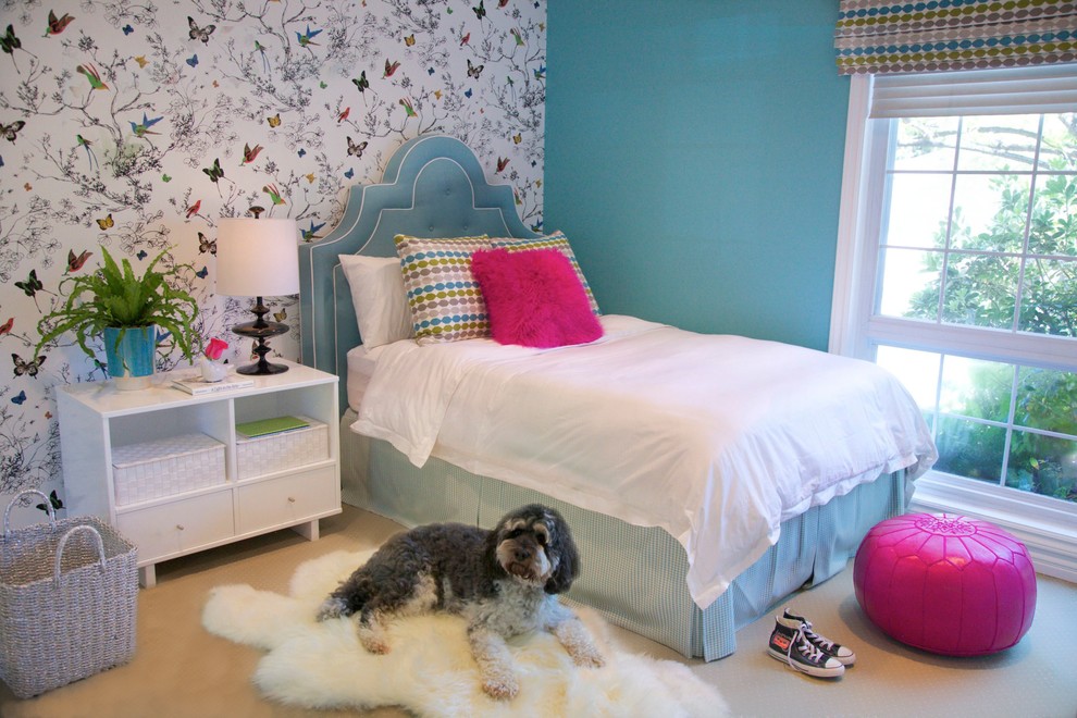 Photo of a traditional kids' bedroom for kids 4-10 years old and girls in Los Angeles with carpet and multi-coloured walls.