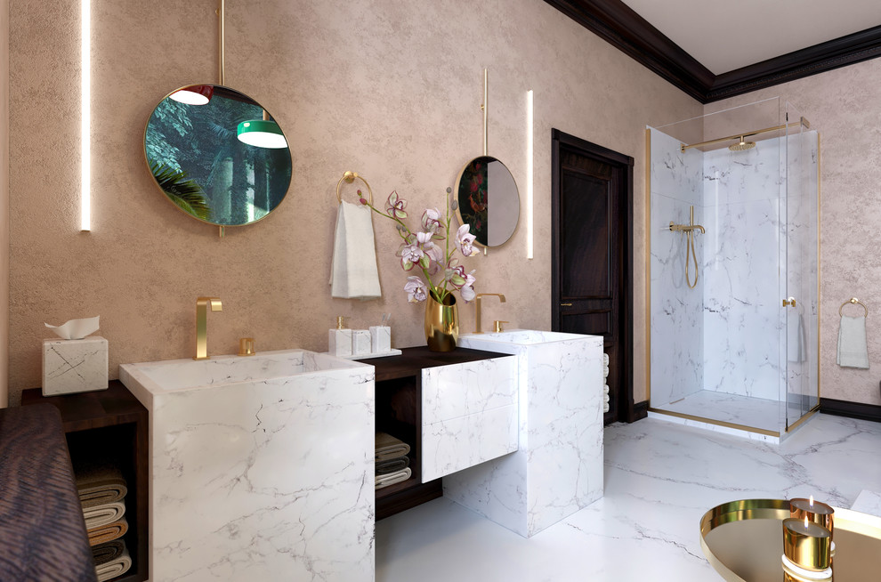Photo of a mid-sized transitional bathroom in London with flat-panel cabinets, white cabinets, a corner shower, marble floors, white floor, brown benchtops, white tile, marble, pink walls, a pedestal sink, wood benchtops and a hinged shower door.
