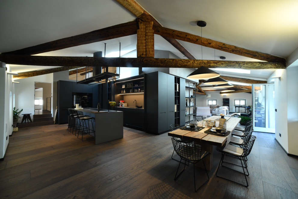 Inspiration for a contemporary open plan dining in Other with white walls, dark hardwood floors and brown floor.