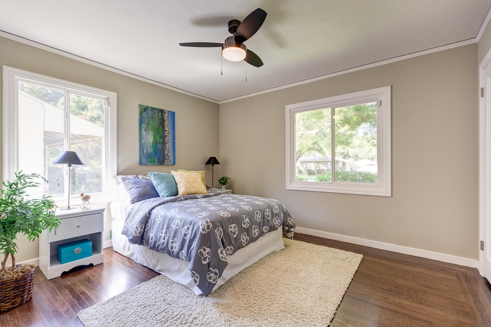 Design ideas for a mid-sized midcentury guest bedroom in Sacramento with grey walls and dark hardwood floors.