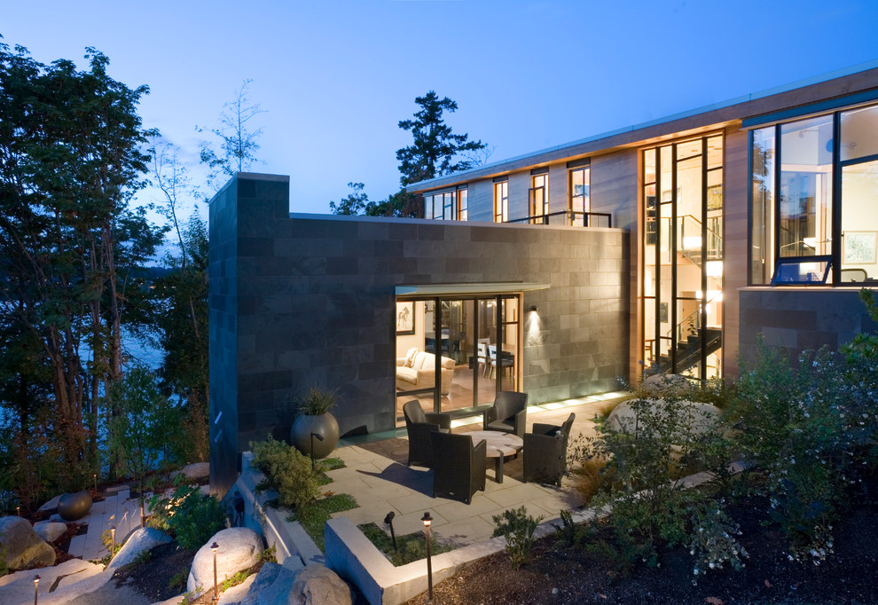 Photo of a contemporary patio in Seattle with no cover.