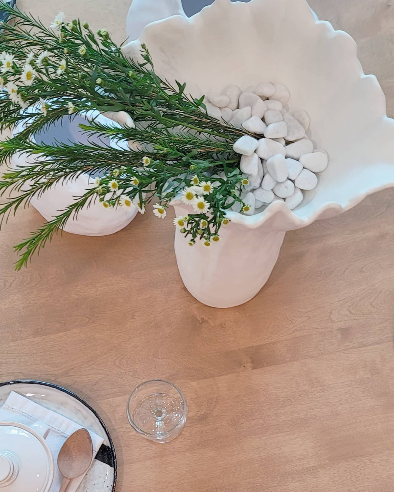 Inspiration for a transitional medium tone wood floor dining room remodel in Cedar Rapids with gray walls
