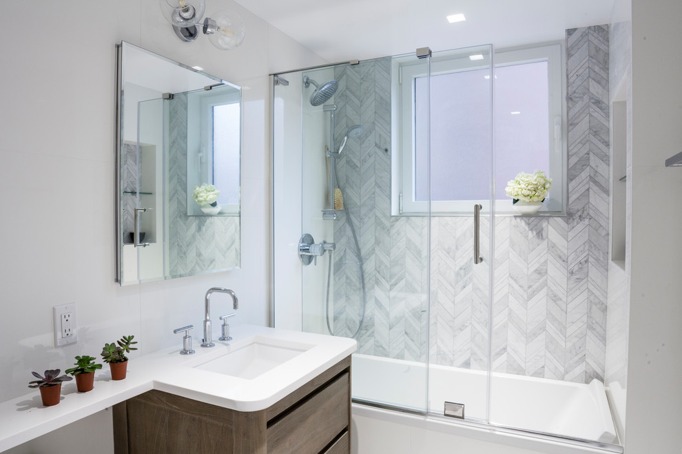Design ideas for a modern master bathroom in New York with white tile, white walls, marble floors, quartzite benchtops, white floor, a sliding shower screen and white benchtops.