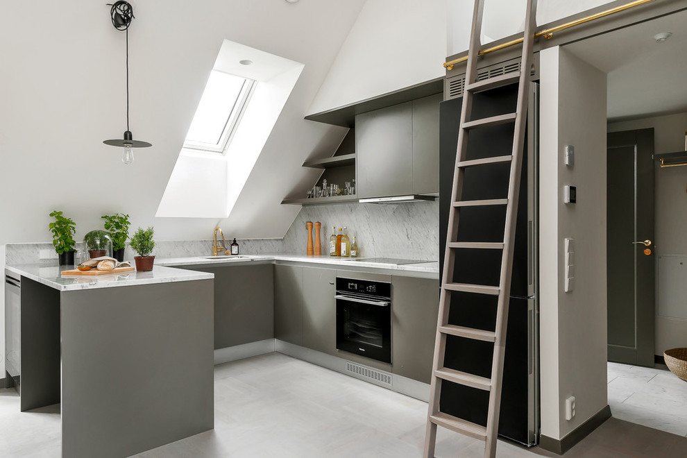 Inspiration for a mid-sized scandinavian u-shaped separate kitchen in Stockholm with a single-bowl sink, flat-panel cabinets, grey cabinets, marble benchtops, black appliances, limestone floors and no island.