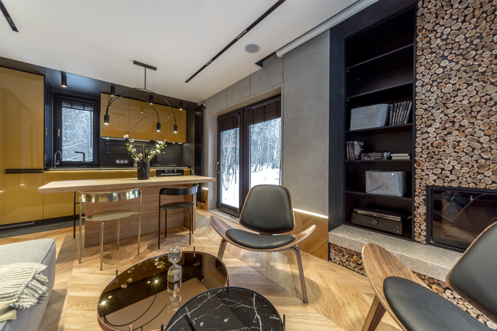 Глянцевая кухня с бетонной стеной