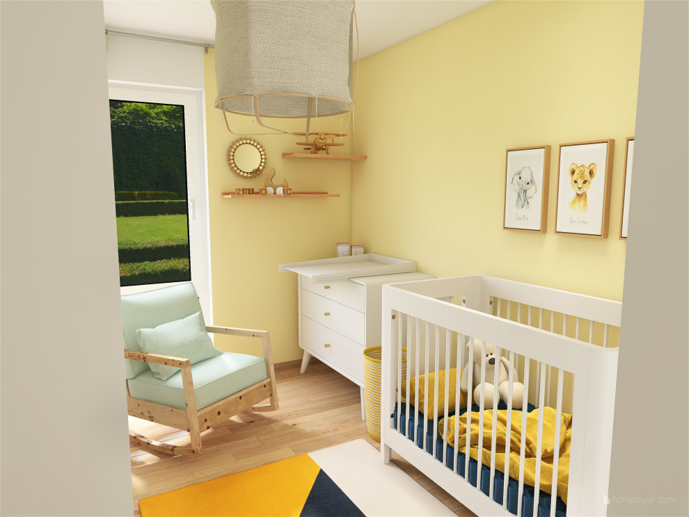 Imagen de habitación de bebé neutra actual pequeña con paredes amarillas