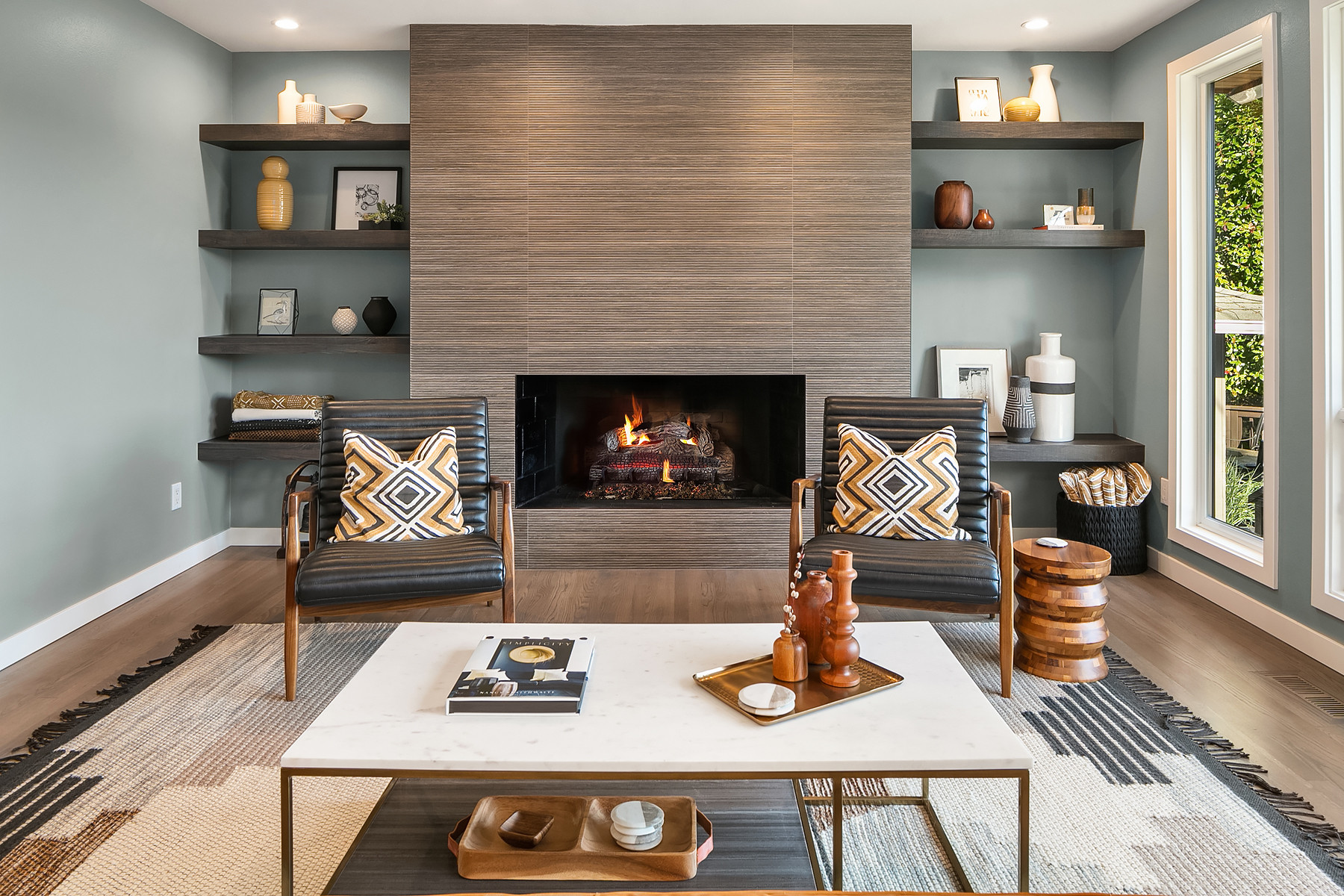 Family Room Fireplace with Floating Shelves