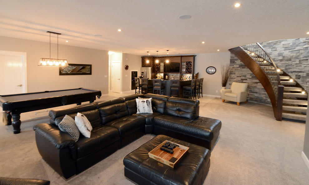Large contemporary walk-out basement in Edmonton with grey walls and carpet.