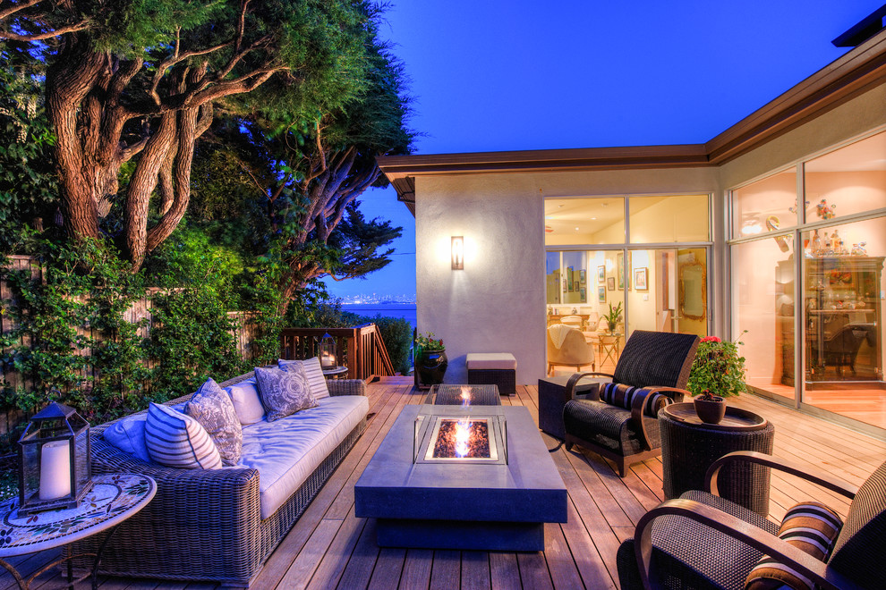 Inspiration for a large contemporary side yard patio in San Francisco with a fire feature and no cover.
