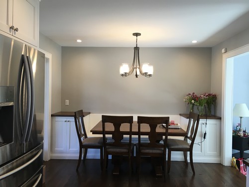 Decor for above kitchen banquette and side cabinets.