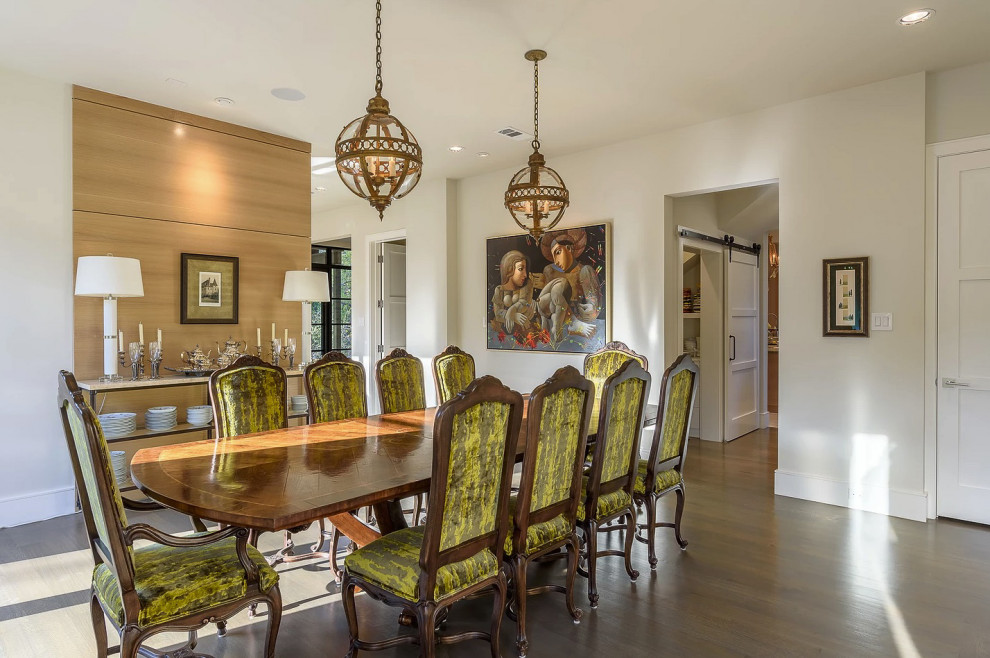 Design ideas for a large modern dining room in Dallas with medium hardwood floors and beige floor.