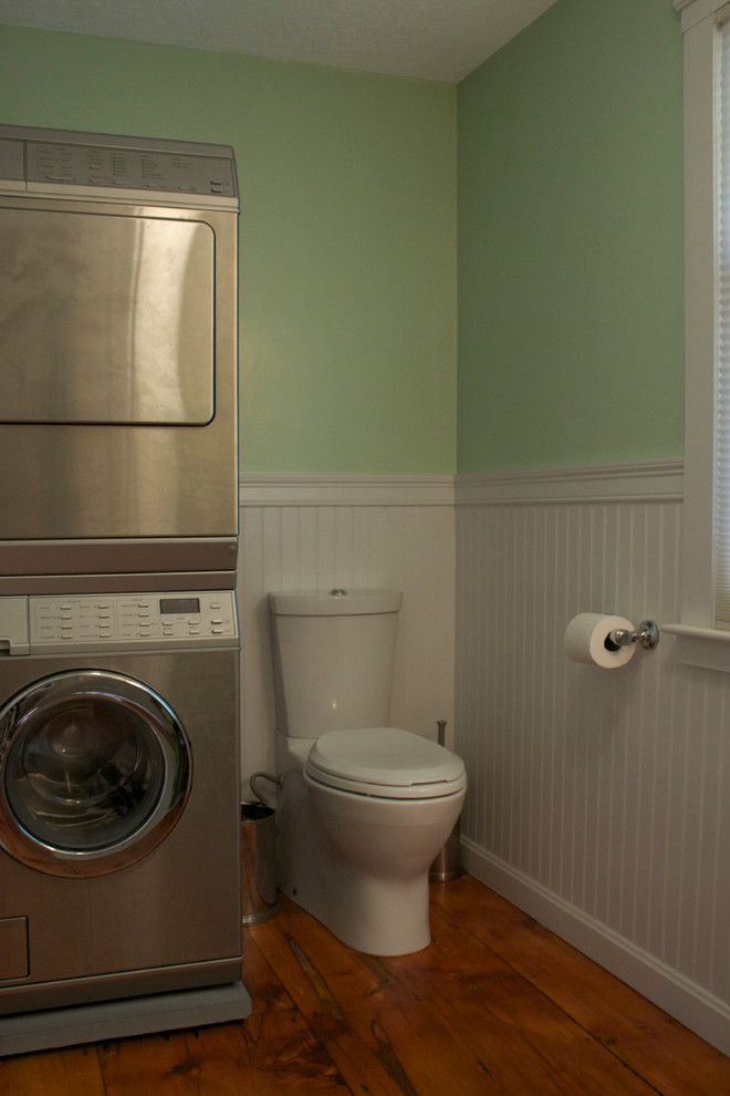 Mid-sized transitional medium tone wood floor bathroom photo in Boston with an undermount sink, shaker cabinets, dark wood cabinets, quartz countertops, a two-piece toilet and green walls