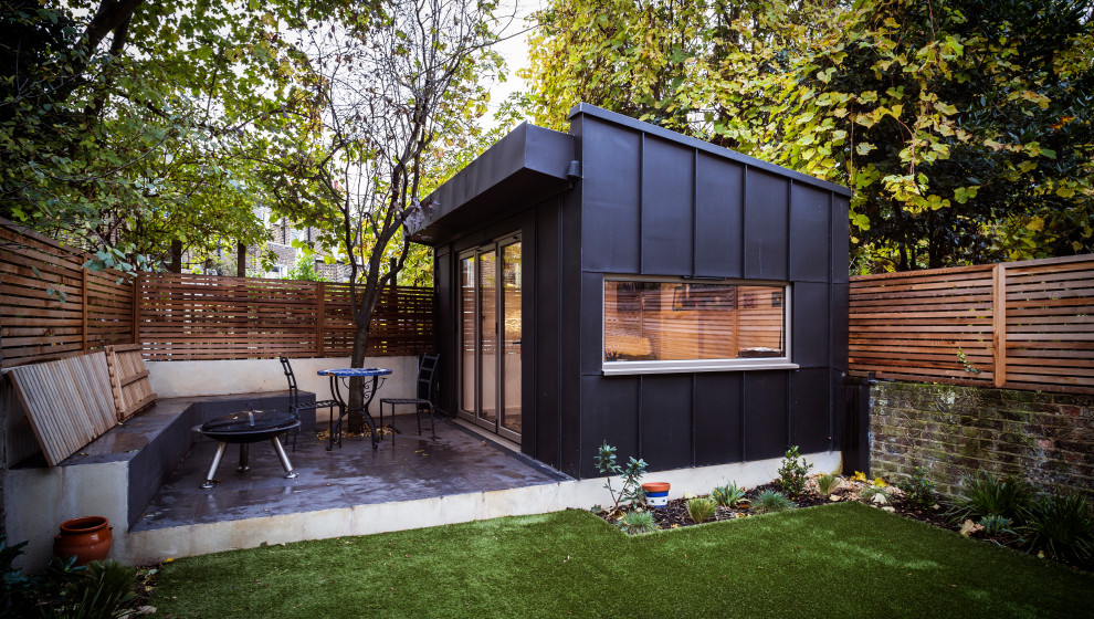 Inspiration pour un abri de jardin design avec un bureau, studio ou atelier.