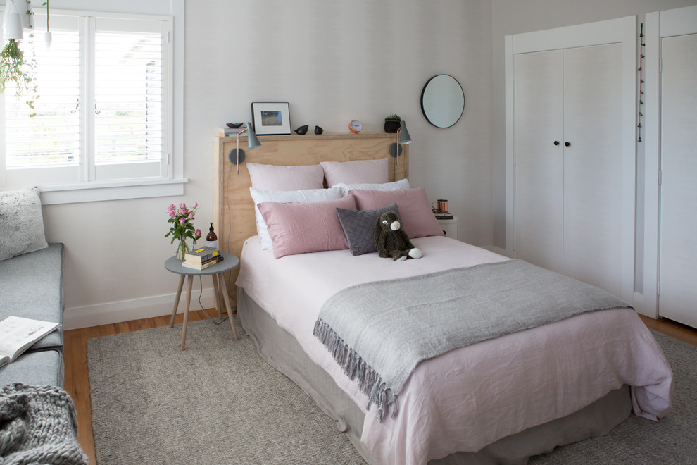 This is an example of a transitional bedroom in Hamilton.