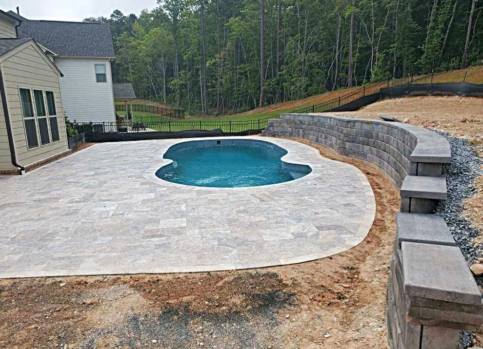 The Oasis Fiberglass Pool Model With Retaining Wall - Traditional ...