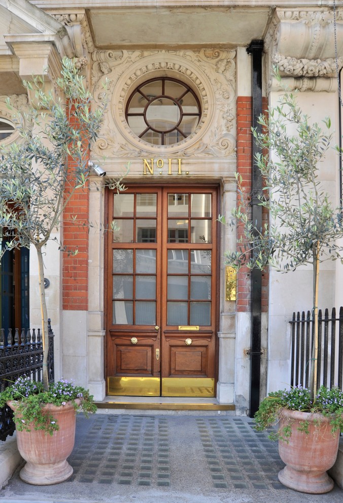 Photo of a traditional front door in London with a double front door and a glass front door.