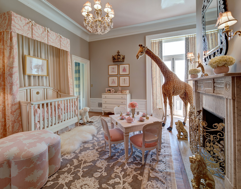 Mansion in May 2014 - La Petite Rose Nursery - Little girl's nursery featuring a color palette of greys and blush pinks.  Fabrics are Schumacher and custom furniture by AFK in California.  Some highlights of the space are the set of Barbie prints with crown above, the high-gloss pink ceiling and of course the 8 foot giraffe.  Photo credit: Wing Wong of Memories, TTL