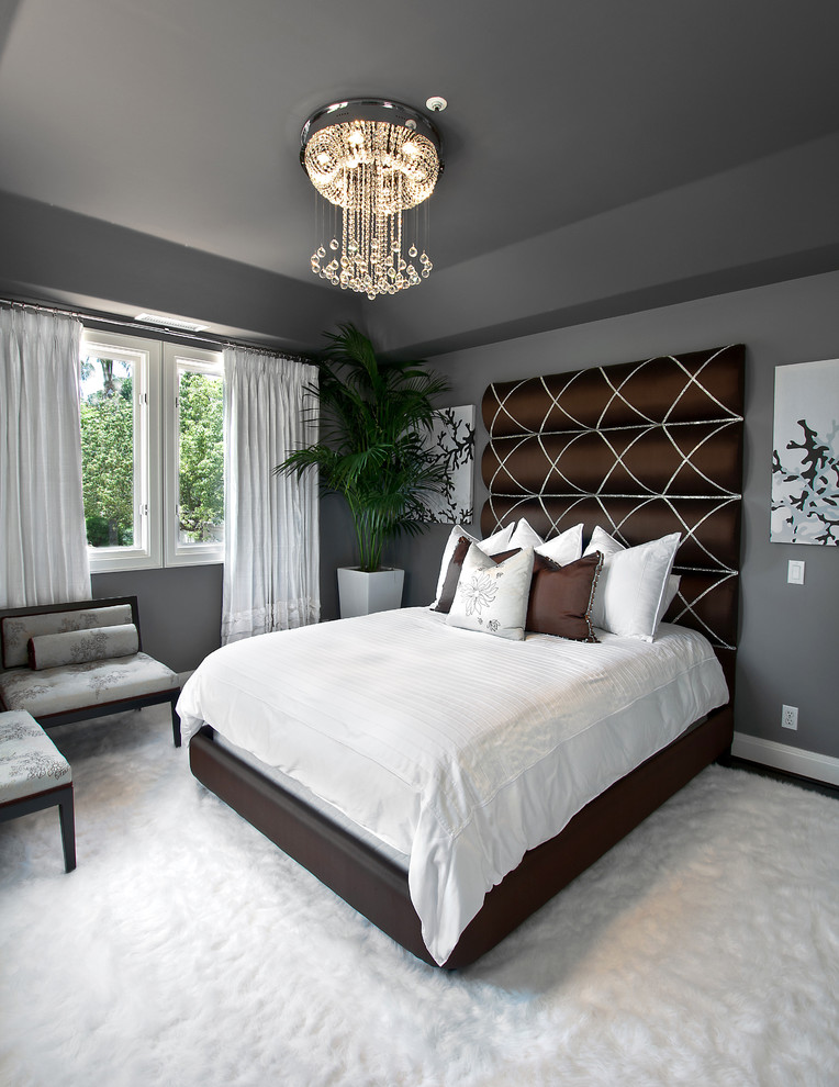 Design ideas for a transitional bedroom in Orange County with grey walls and carpet.