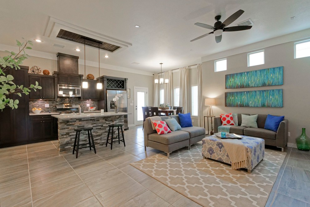 Inspiration for a mid-sized transitional open concept ceramic tile home design remodel in Austin with gray walls
