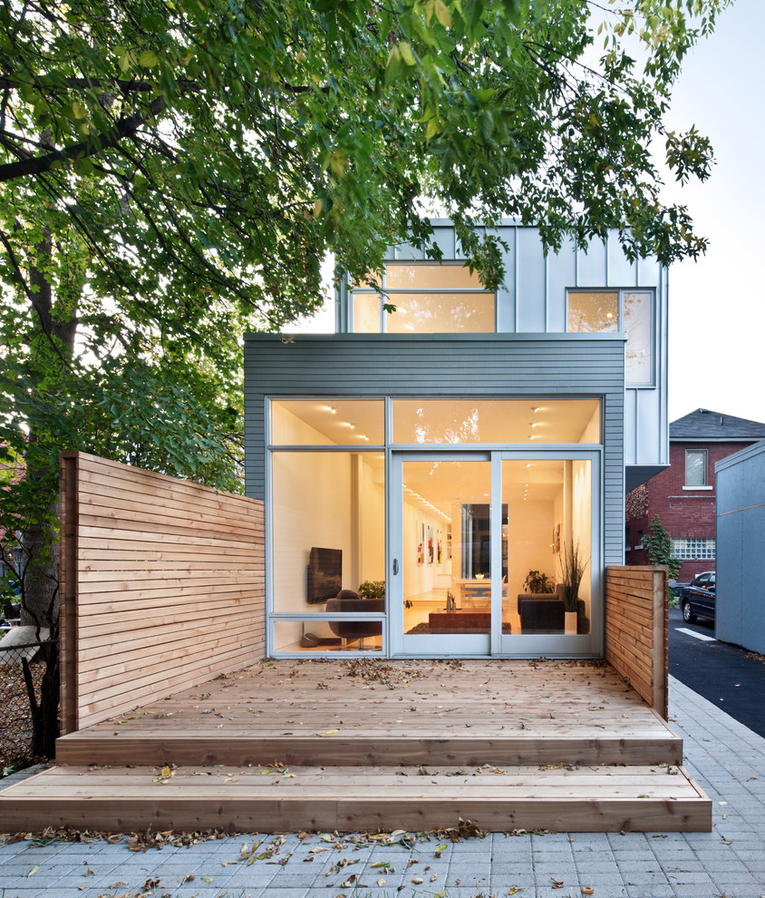 Inspiration for a contemporary exterior in Ottawa with metal siding.