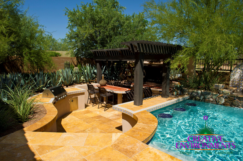 Huge minimalist backyard stamped concrete and custom-shaped infinity home design photo in Phoenix